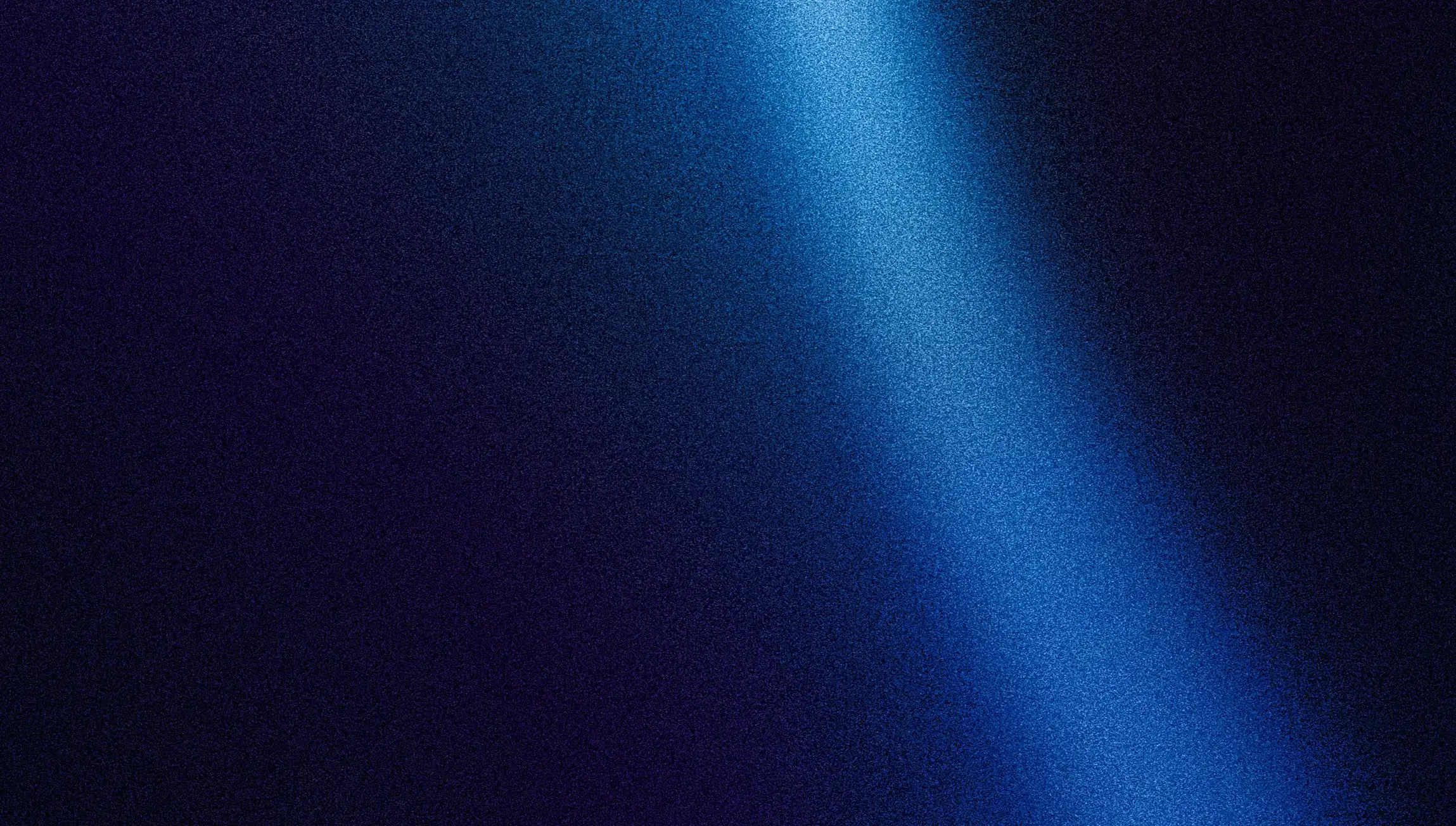 An image of a blue faded paint streak across a black background.